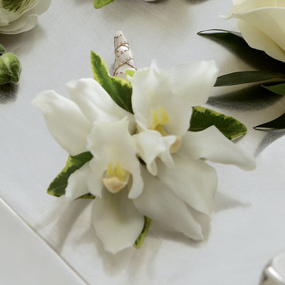 White Mini Cymbidium Boutonniere –  Tda Balloons, Taylors SC